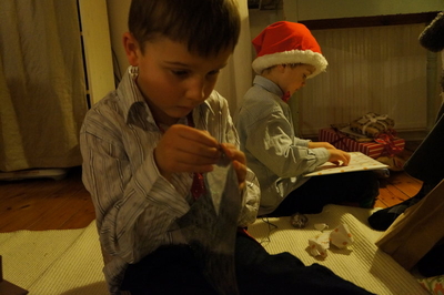 Leo opening gifts